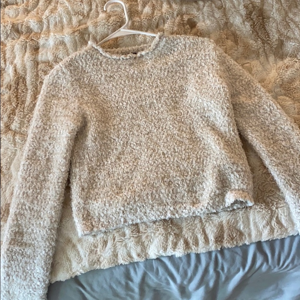 White knitted sweater